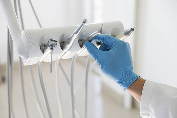 Professional Tooth Extraction technician working in St. James City, FL